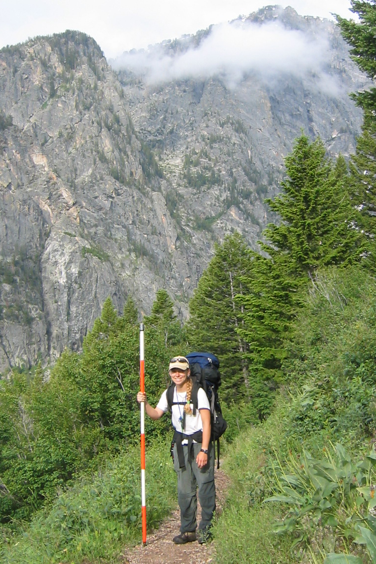 Jennifer Gremer stands while hiking a trail