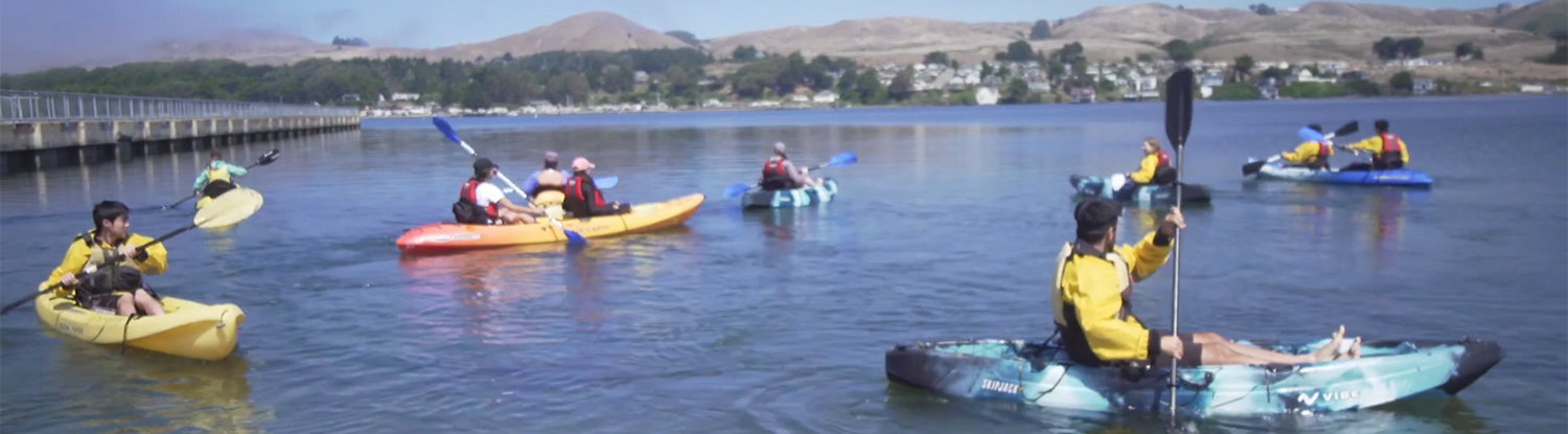 Michael Brito and fellow students kayak at Bodega Bay