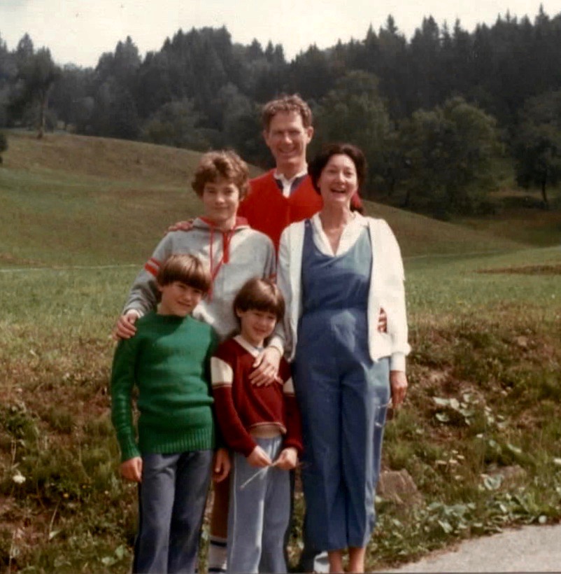 Lin and David Weaver stand with their family in the French Alps