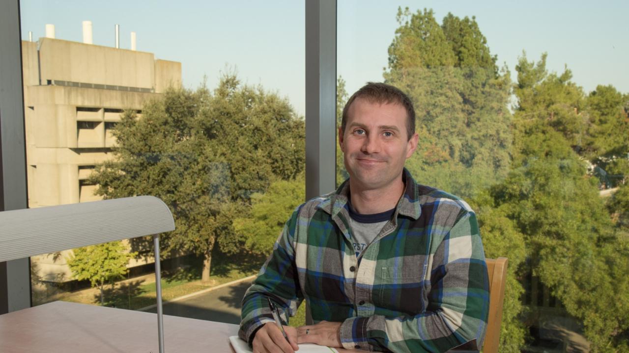 Genetics and genomics undergraduate Michael Sramek studies between classes at the Science Lab Building. David Slipher/UC Davis