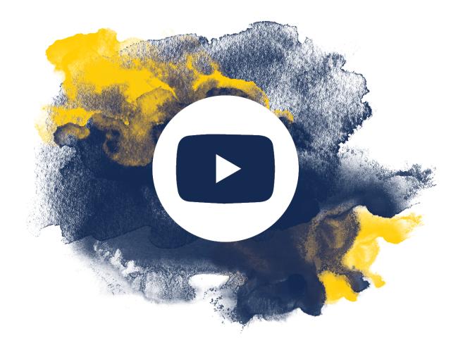 Play button icon over blue and gold watercolor marks