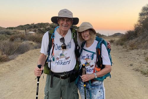 Mark Presky and Marsha Saltman in hiking gear