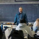Eric Sanford teaches a class of students. 