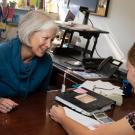 JoAnne Engebrecht talks with a student in her office
