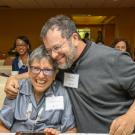 Jonathan Eisen, along with his mother, Laura, celebrate at the ADVANCE Award ceremony. (UC Davis)