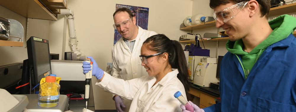 Students and faculty in lab