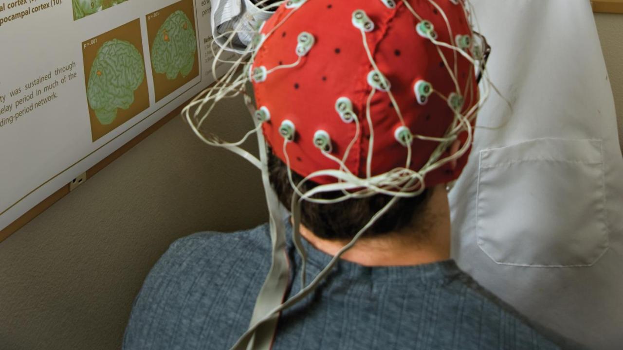 Professor Charan Ranganath is a member of the band Here Knows When, which is comprised of UC Davis researchers and a UC Davis alum. Karin Higgins/UC Davis Charan Ranganath uses an EEG cap.