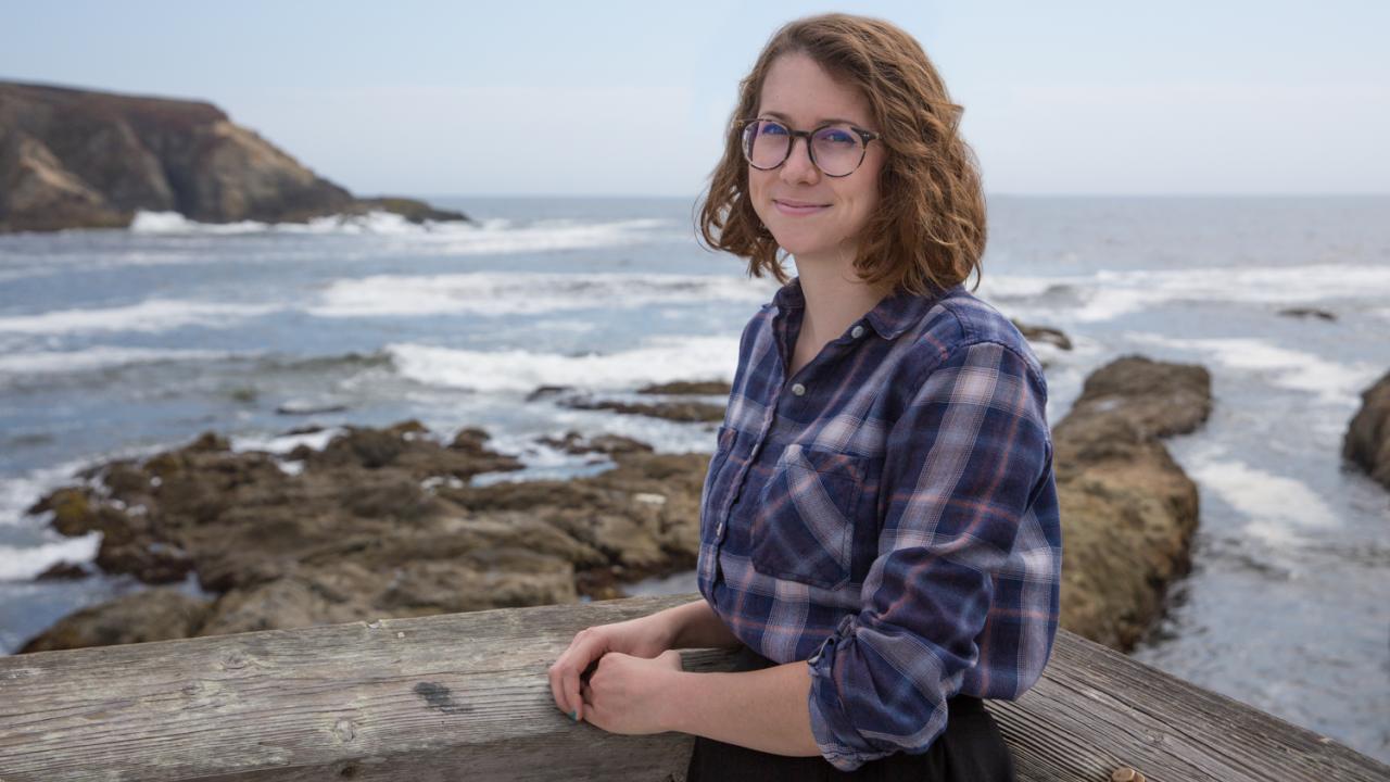 Emily Meyers sits outside the Bodega Marine Laboratory