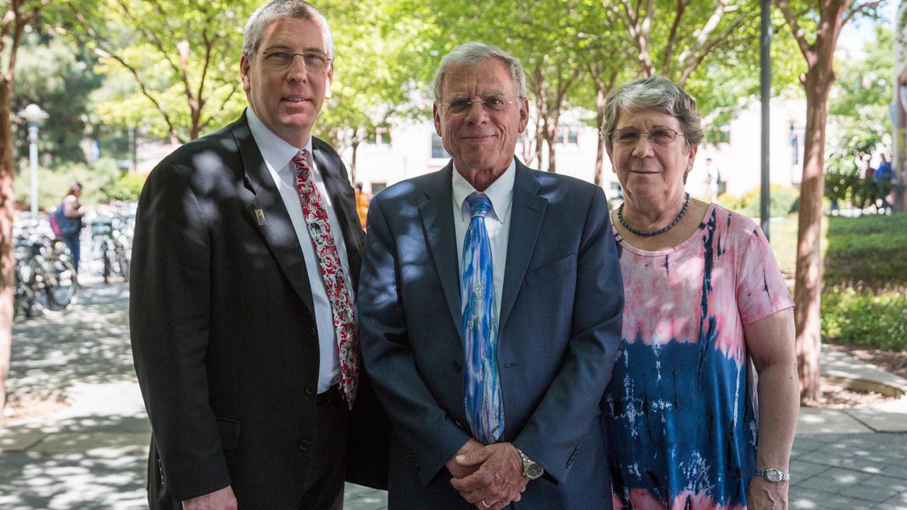 Left to right: College of Biological Sciences Dean Mark Winey, Professor Emeritus John Cuppoletti and Professor Emeritus Danuta Malinowska pose outside the Life Sciences Building during a campus visit. David Slipher/UC Davis College of Biological Sciences Dean Mark Winey, Professor Emeritus John Cuppoletti and Professor Emeritus Danuta Malinowska pose outside the Life Sciences Building during a campus visit.