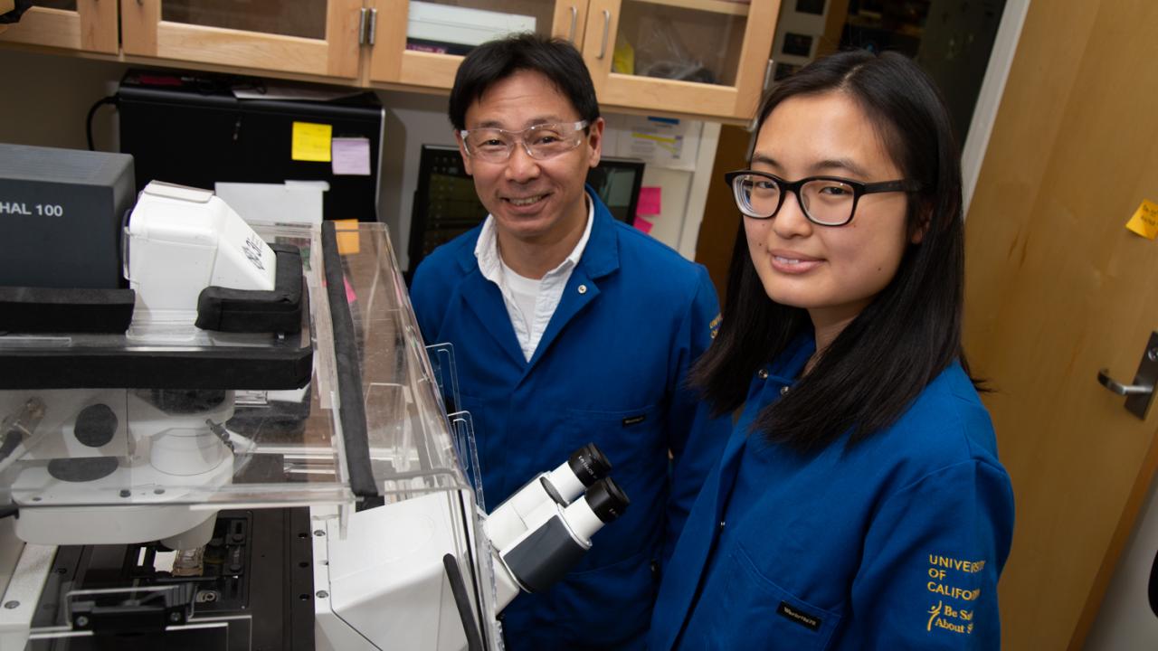 Soichiro Yamada and Joleen Cheah stand in the lab