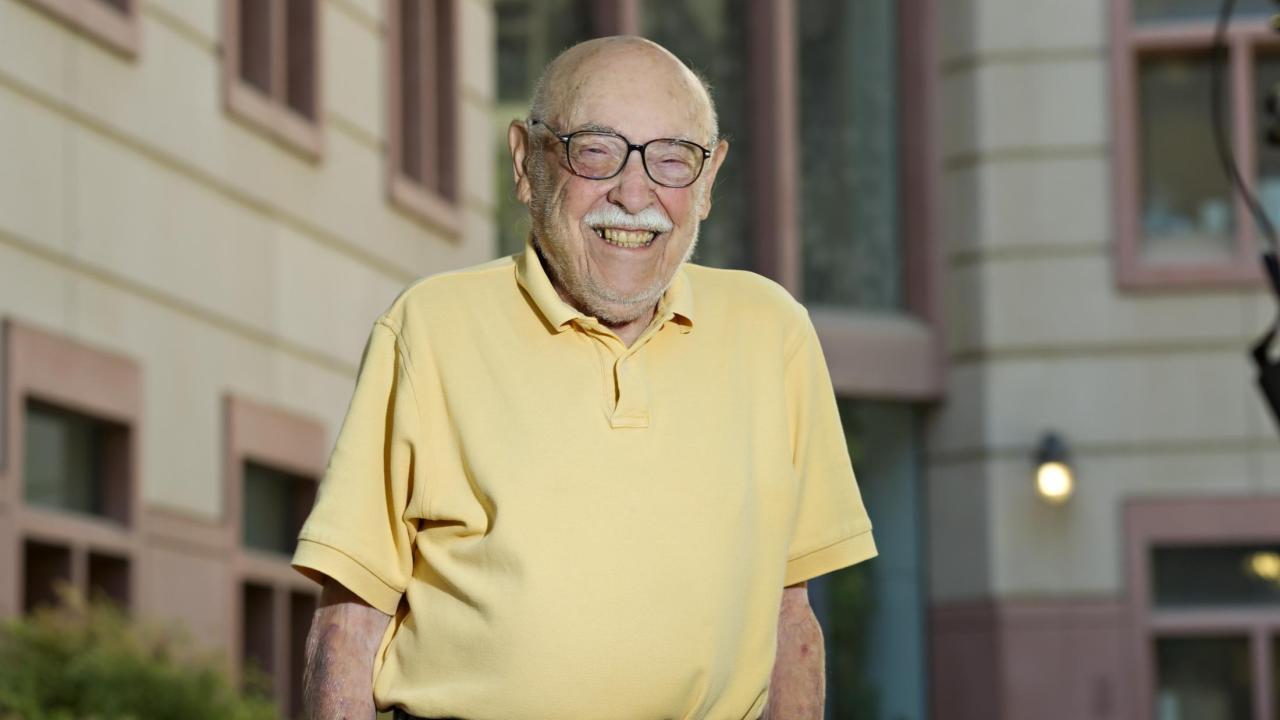 Mel Green stands in front of Life Sciences building at UC Davis
