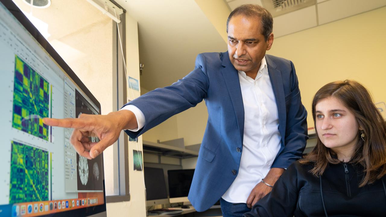 Why We Remember, a new book by Center for Neuroscience researcher Charan Ranganath, combines the latest research with personal experience to share how memory actually works and the role it plays in our daily lives. Pictured, Ranganath with Nora Wolf, a Ph.D. student in psychology who is studying human memory in the Dynamic Memory Lab. (Sasha Bakhter / UC Davis)