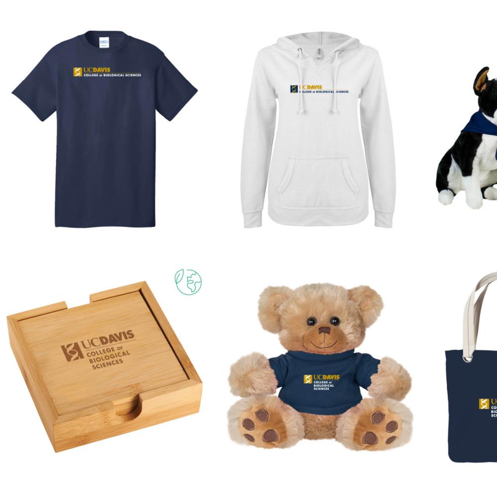 Assorted UC Davis College of Biological Sciences merchandise including shirts hoodies mugs tote bags plush toys and coasters