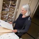 Ellen Dean looks at a specimen from the Center for Plant Diversity.