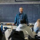 Eric Sanford teaches a class of students. 