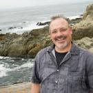 Gary Cherr Stands Near the Coast