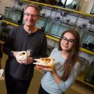 Wildlife, fish and conservation biology student Angelly Tovar, Professor Peter Wainwright and wildlife, fish and conservation biology student Victoria Susman stand in Wainwright's lab.