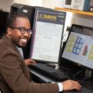 Wilsaan Joiner sits at his desk