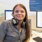 Pictured here, Hubbard with a spectrogram of whale feeding calls. Spectrograms convert audio sounds into visual representations, showing amplitude and frequencies over time. (Sasha Bakhter / UC Davis)  