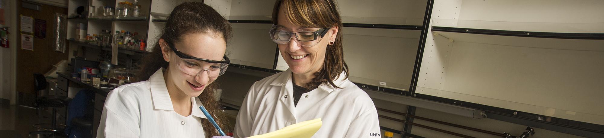 Researchers in lab setting
