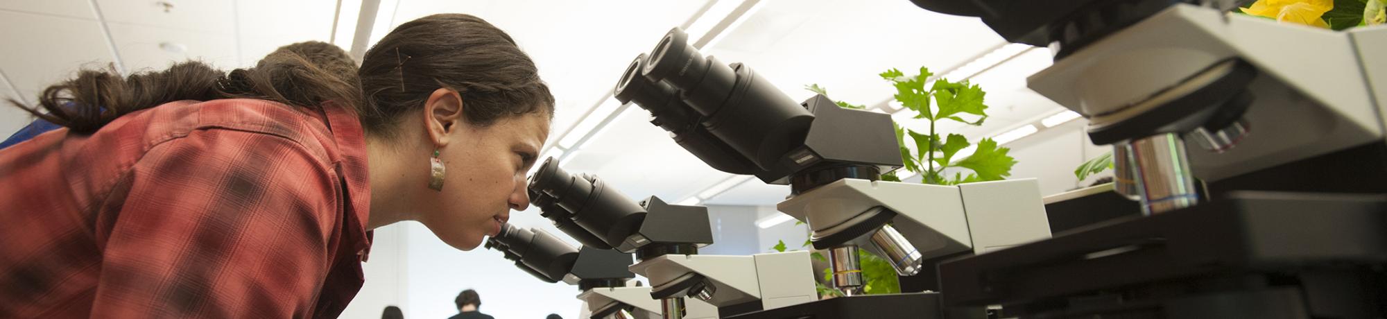 Student and microscope