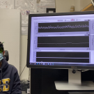 student demonstrating use of functional interferometric diffusing wave spectroscopy